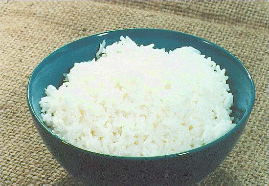 Distinguished diplomats ate handfuls of cold rice when Tony Hall threw a Thanksgiving reception designed to remind the diplomatic corps of the scale of world hunger.