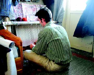 Peace Corps Volunteer Sam Tranum wove in secret on the floor of his bedroom in Turkmenistan after the local government expelled him from the carpet-making school in Abadan